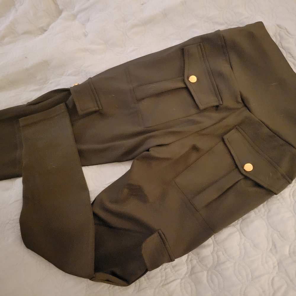 Black butt shaping leggings with side and back pockets , and a striped tube top